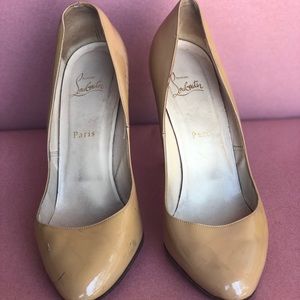 Beige patent Christian Louboutin heels. Size 10.